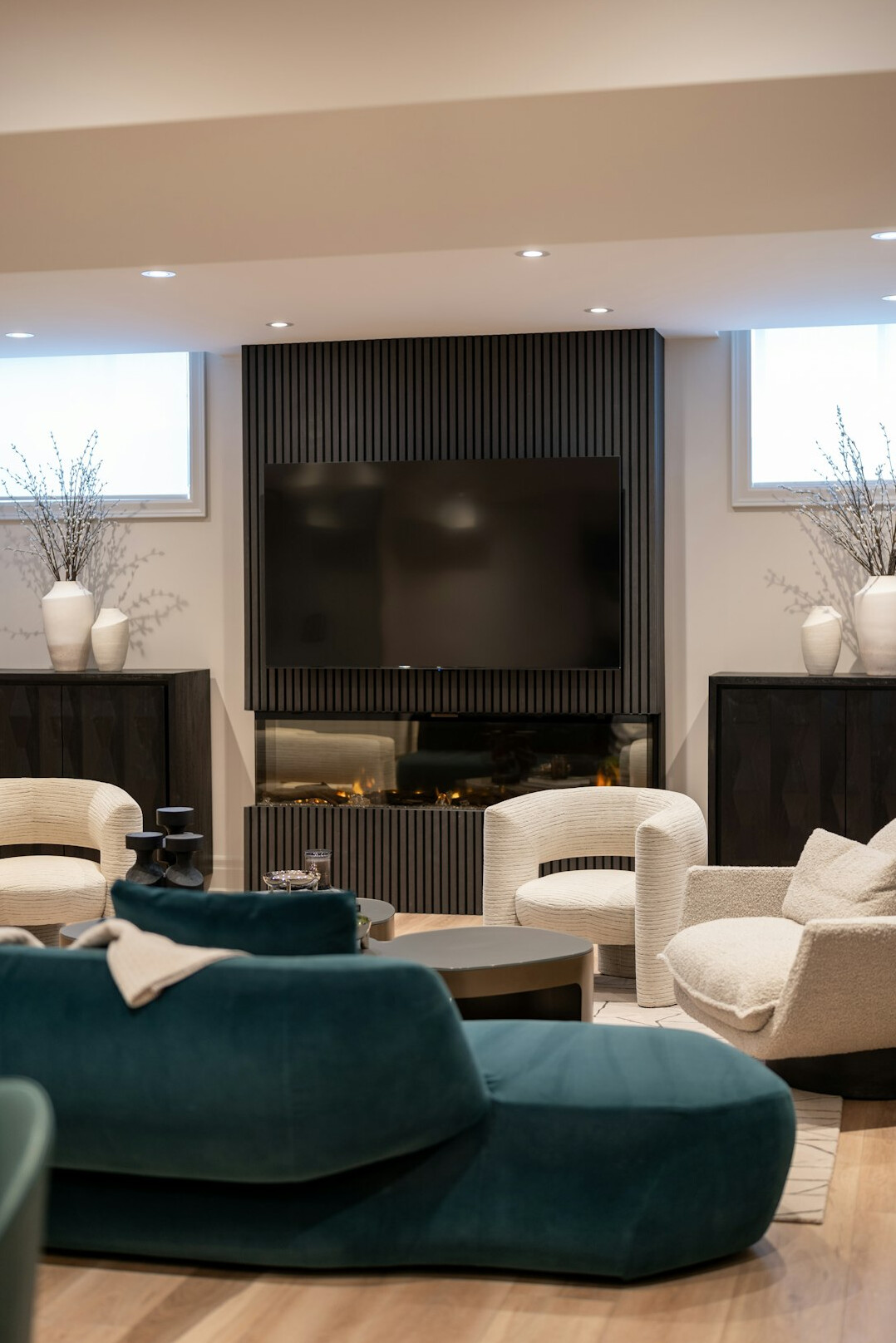 Audience watching television in a modern living room